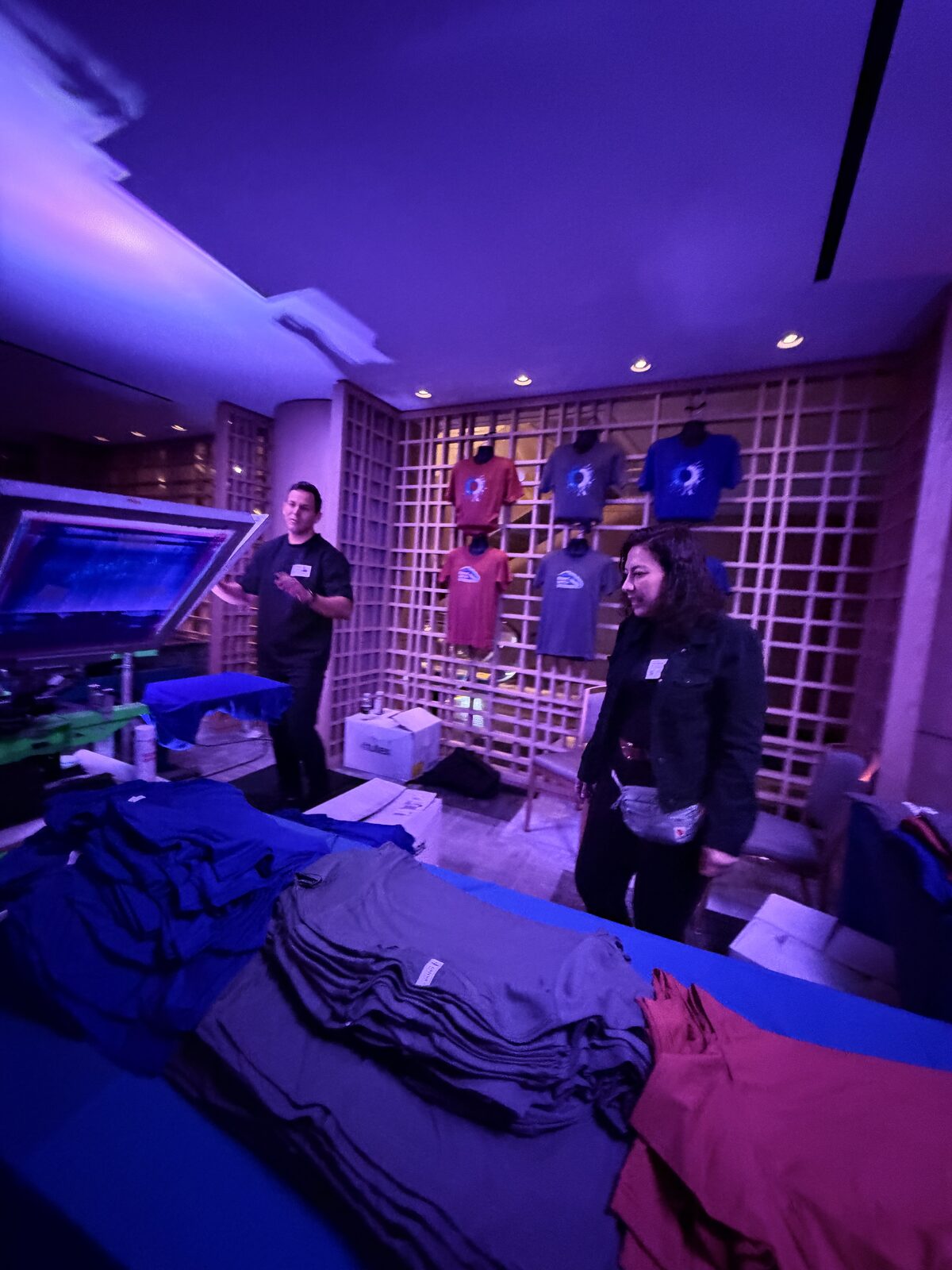 Evening merch table staged with product